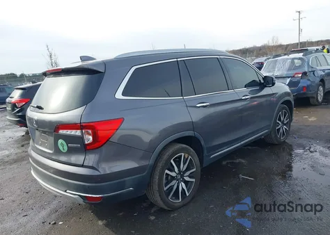 2019 Honda Pilot Touring z USA, uszkodzony, nr VIN 5FNYF5H99KB033617